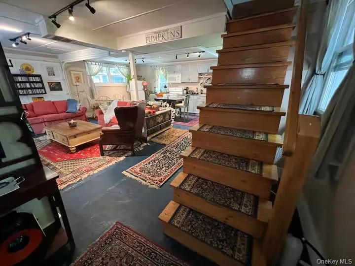 Common area with stairs Common area with stairs