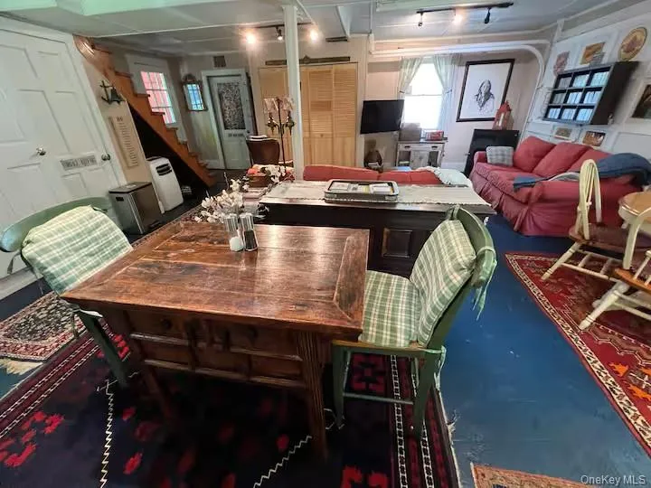 Dining room featuring stairway Dining room featuring stairway