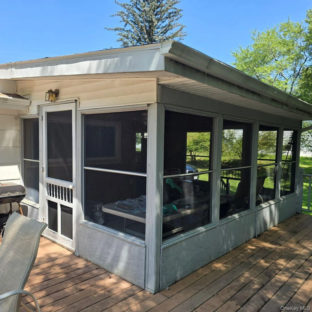 Deck with a sunroom Deck with a sunroom