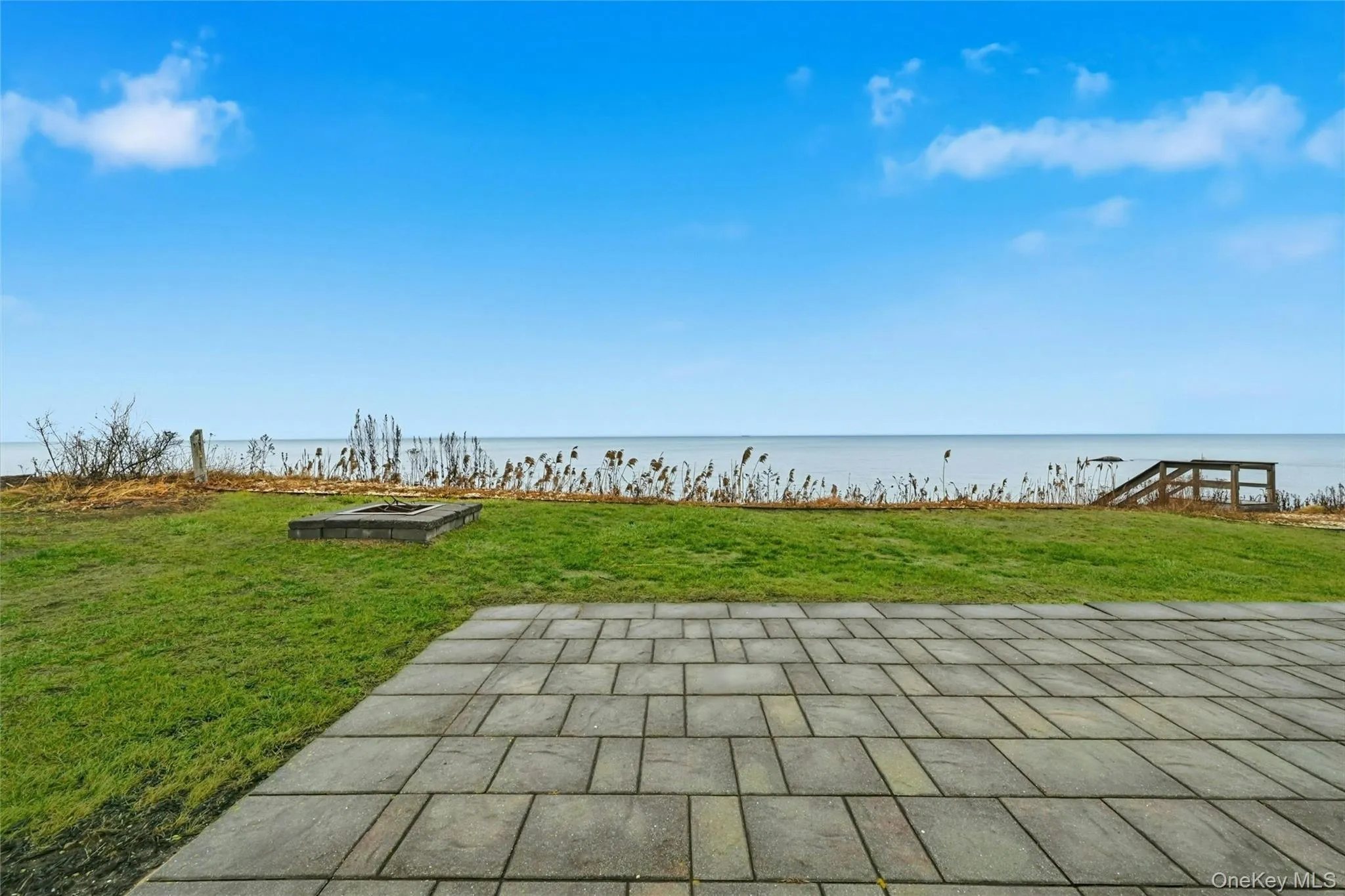 View of patio with a water view View of patio with a water view