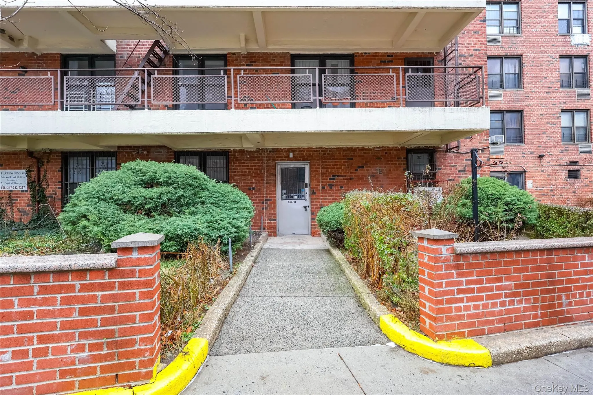 Doorway to property with brick siding Doorway to property with brick siding