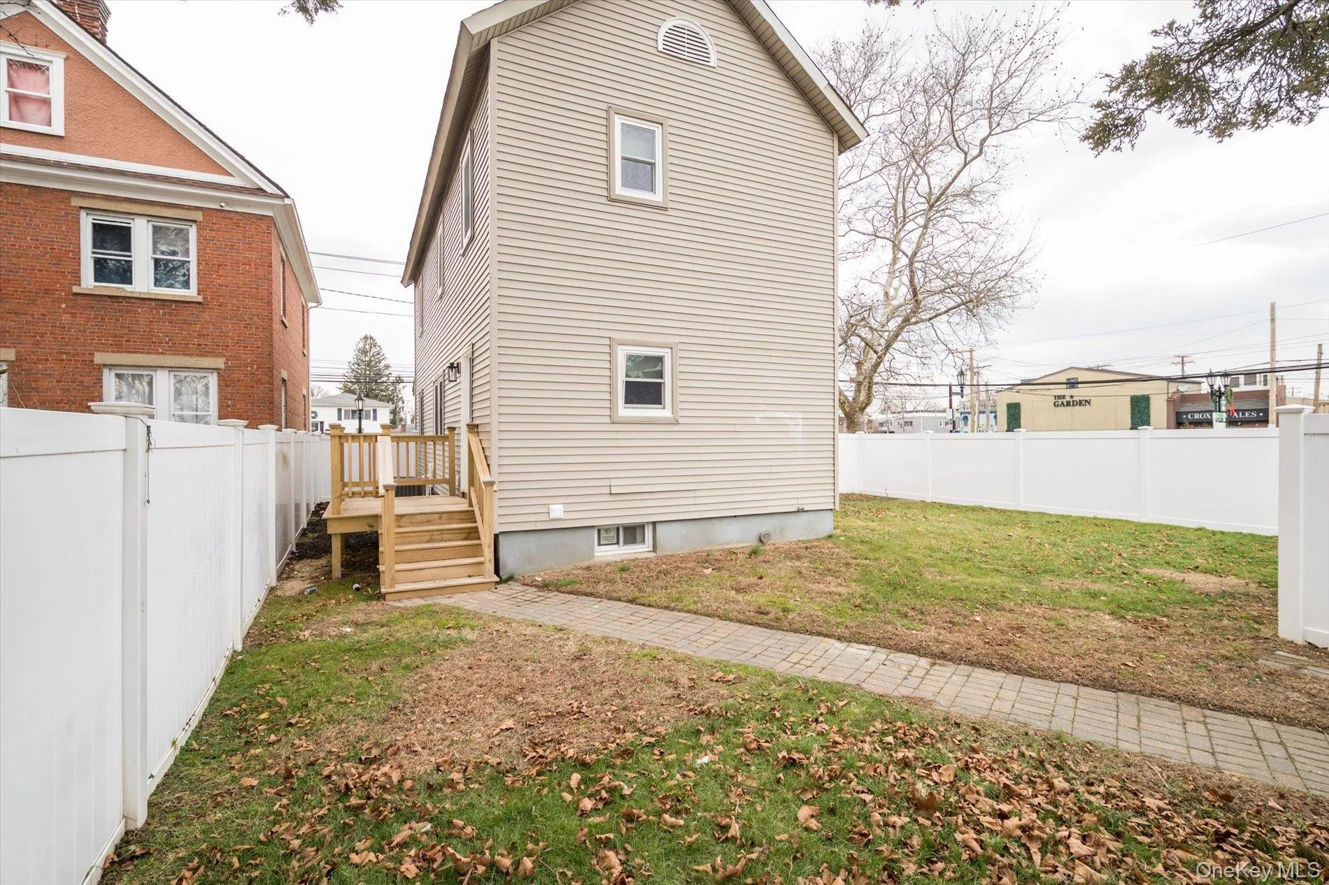 Back of house featuring a fenced backyard Back of house featuring a fenced backyard