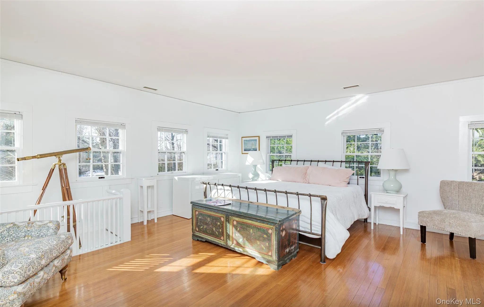 Bedroom featuring hardwood / wood-style flooring Bedroom featuring hardwood / wood-style flooring