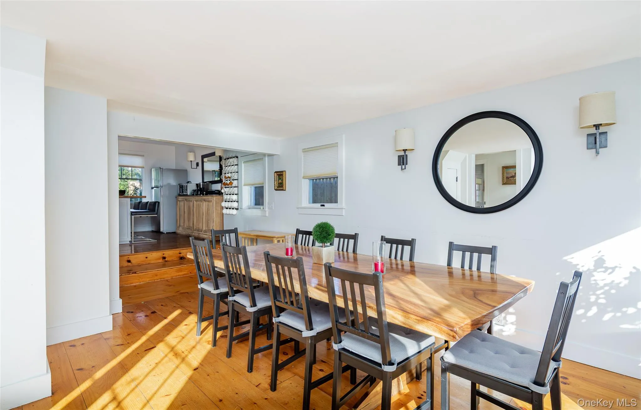 Dining space with light wood finished floors Dining space with light wood finished floors