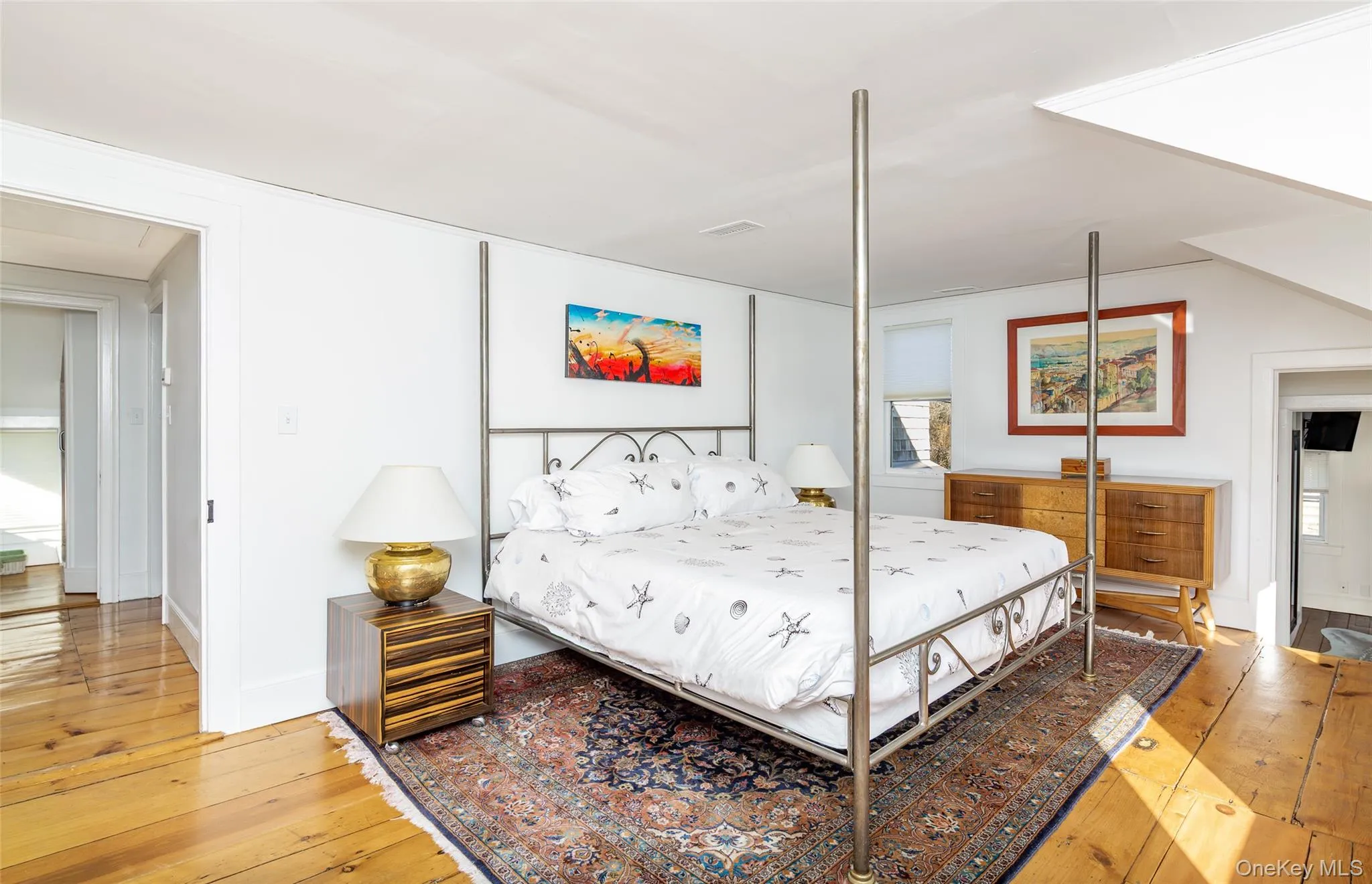 Bedroom featuring light wood-type flooring Bedroom featuring light wood-type flooring