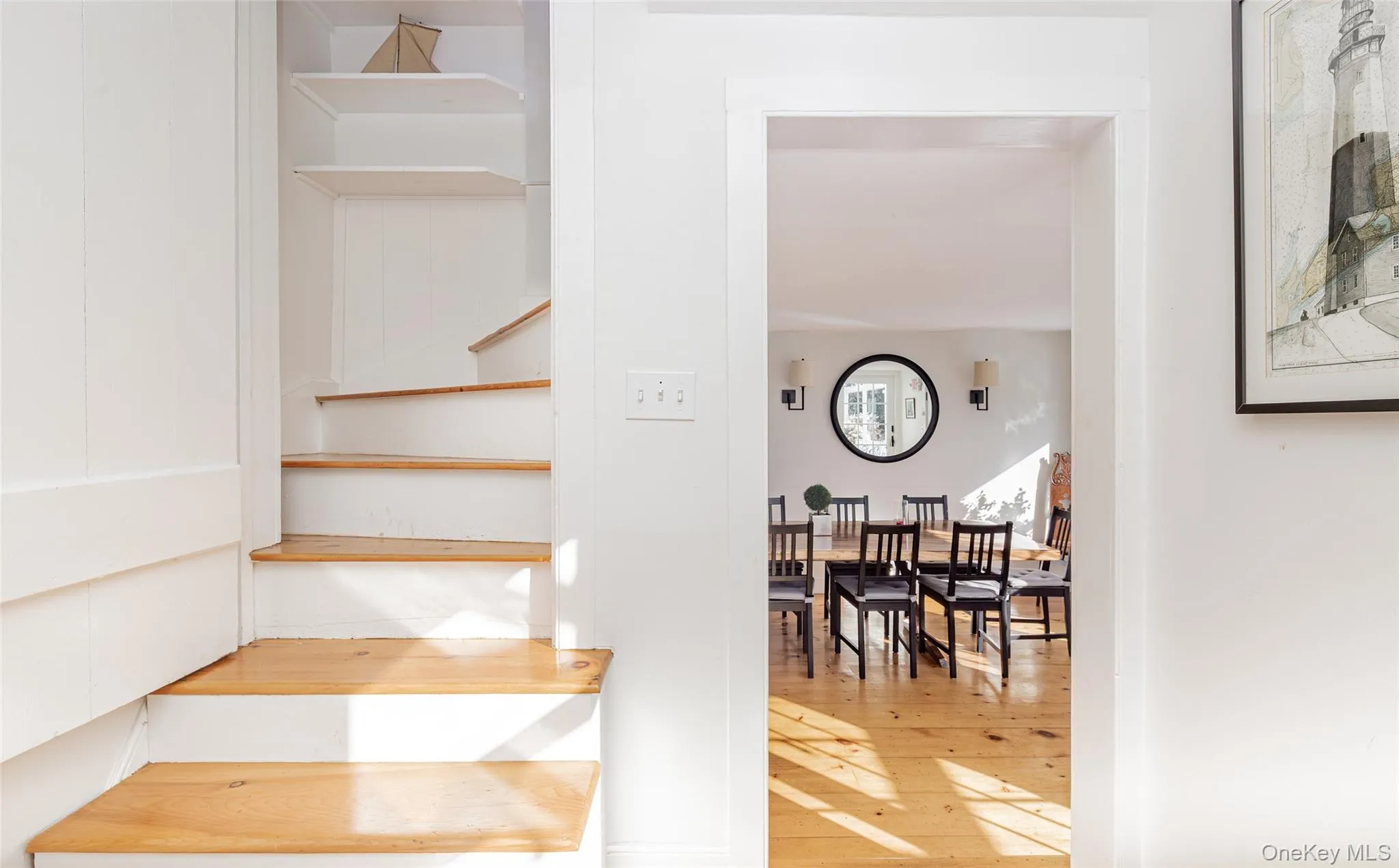 Staircase featuring wood-type flooring Staircase featuring wood-type flooring