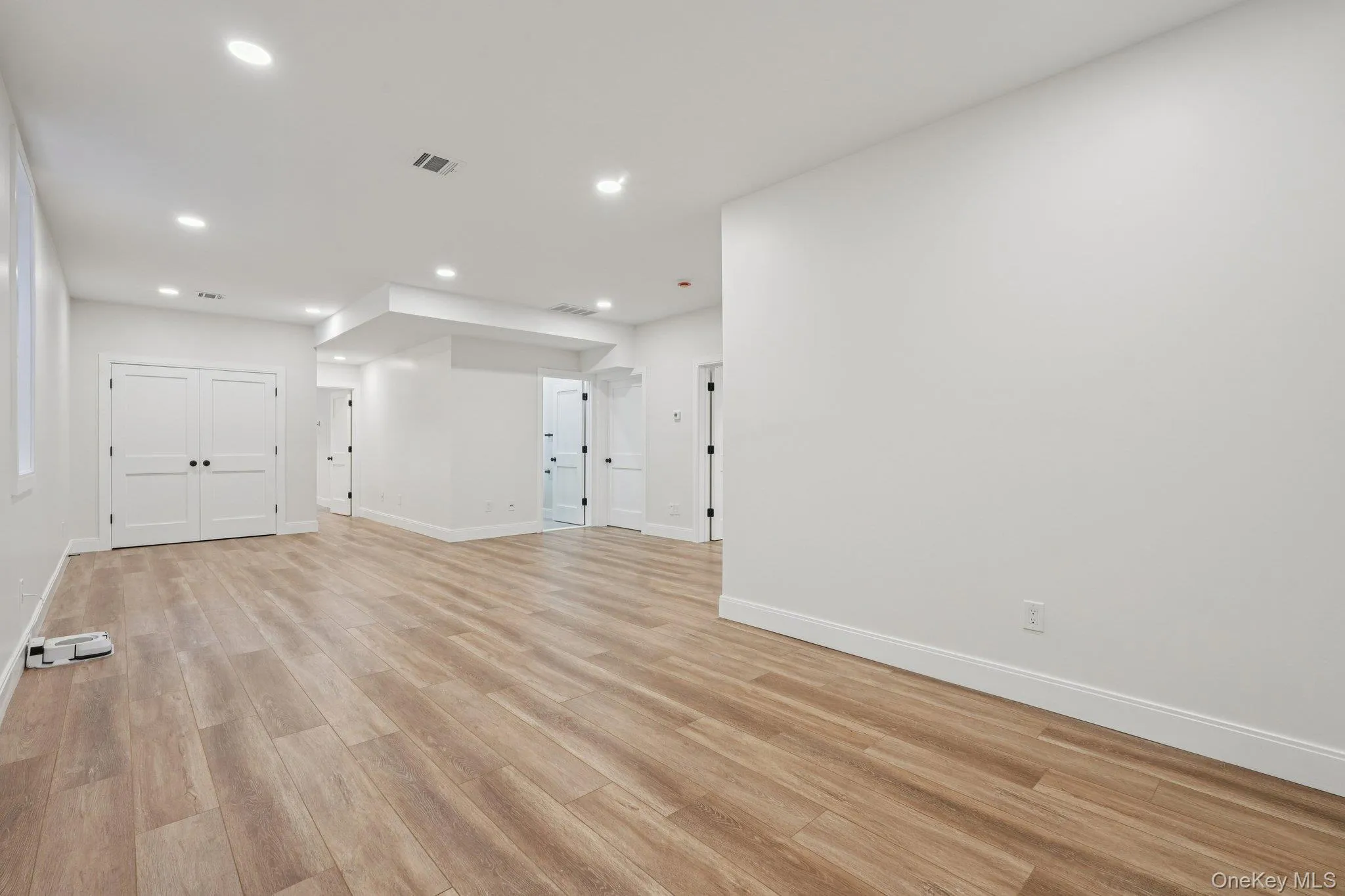 Lower level family room with full size bathroom. Lower level family room with full size bathroom.