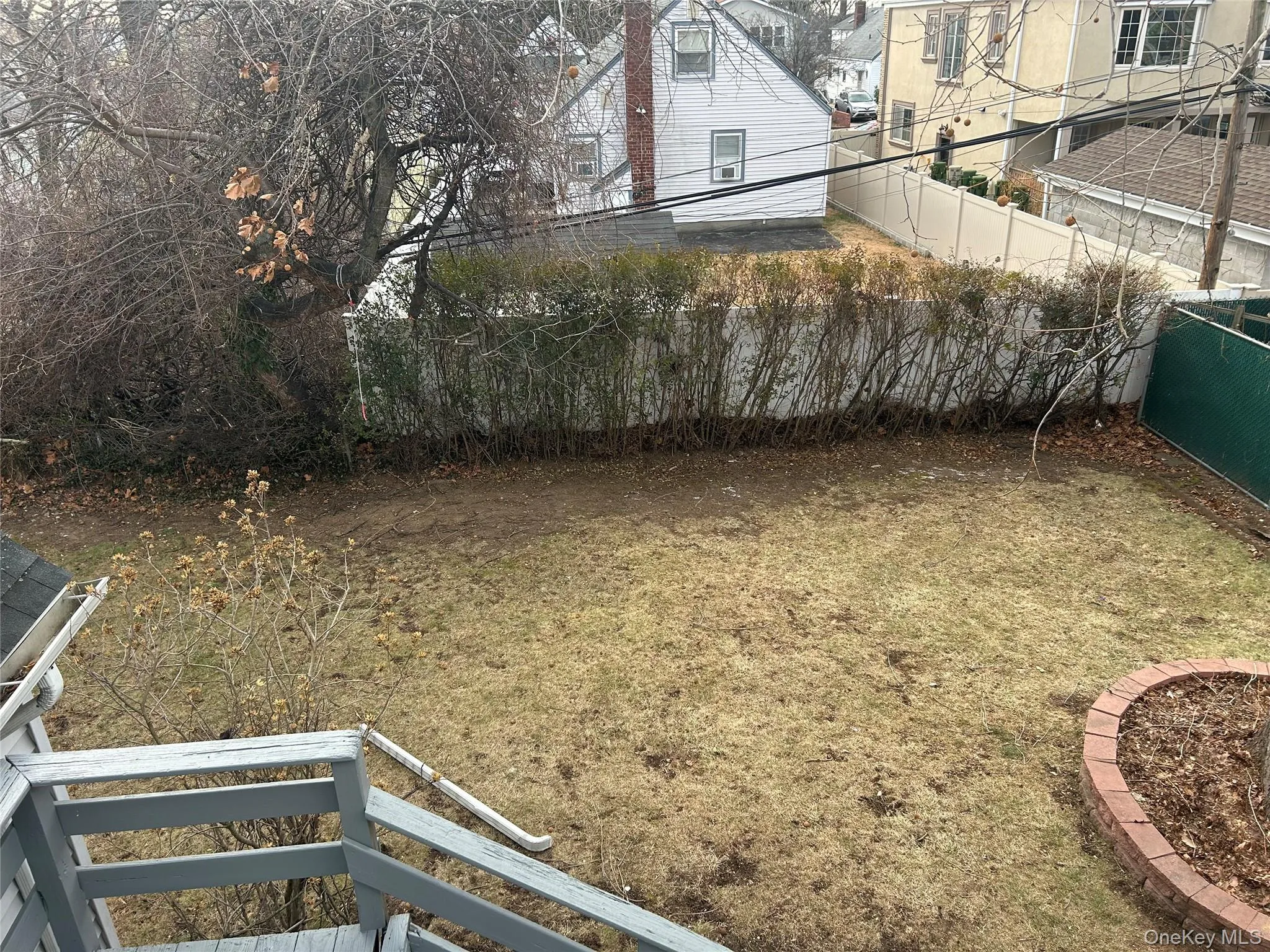 View of yard with a balcony View of yard with a balcony