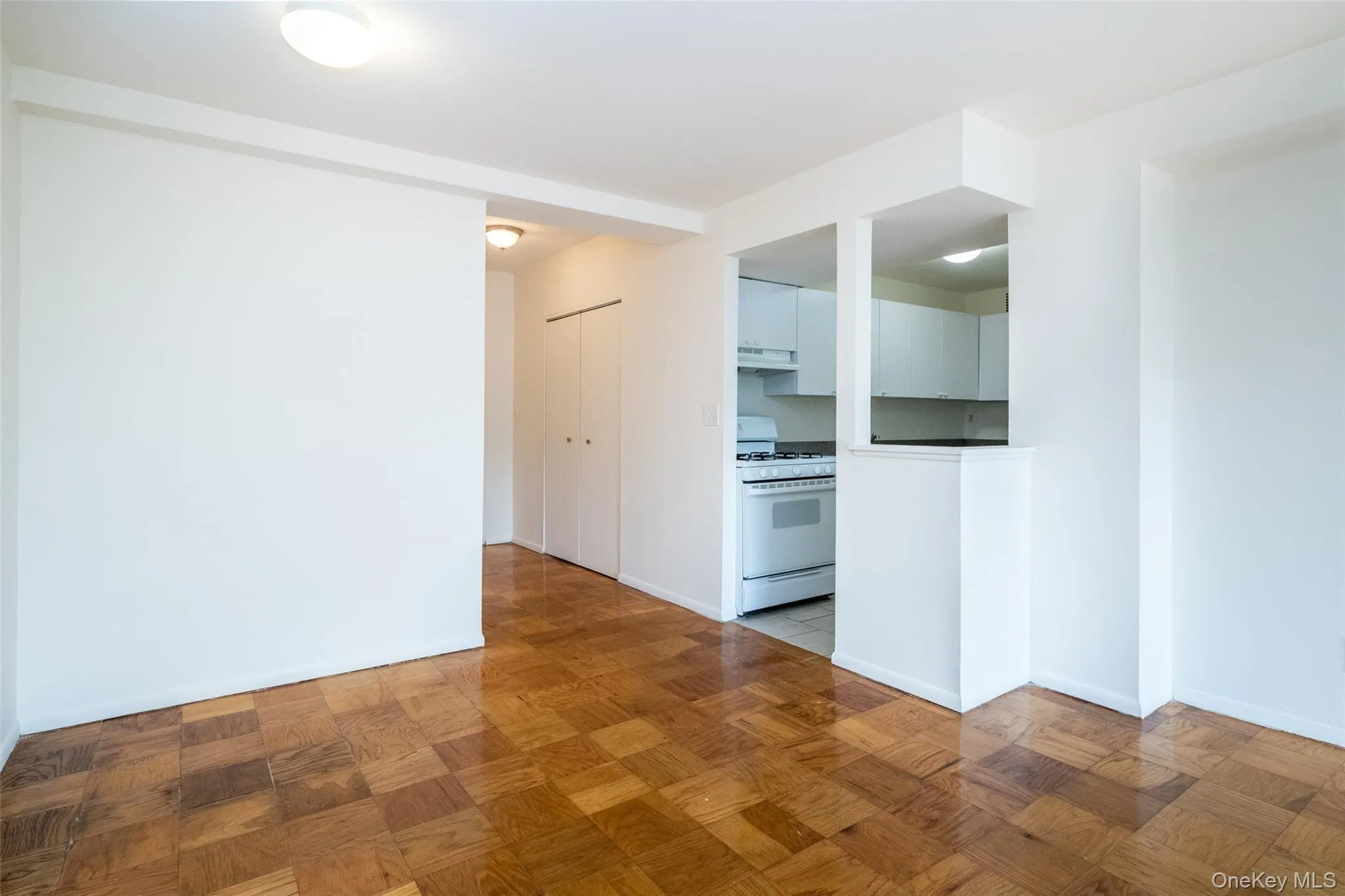 Unfurnished room with baseboards Unfurnished room with baseboards