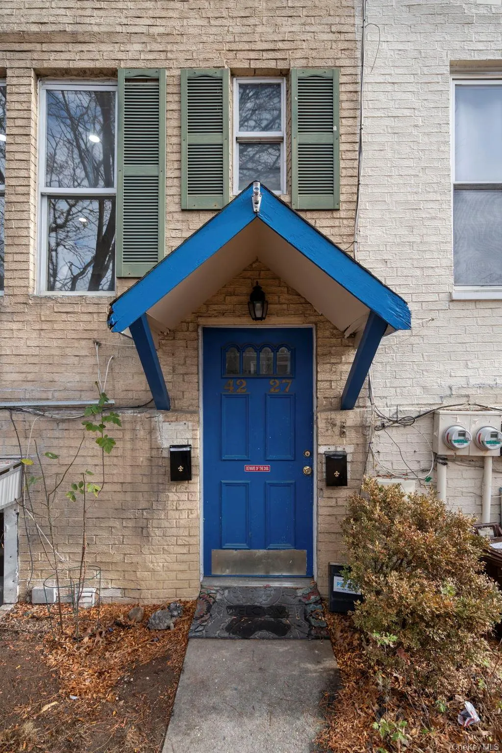 Doorway to property with brick siding Doorway to property with brick siding