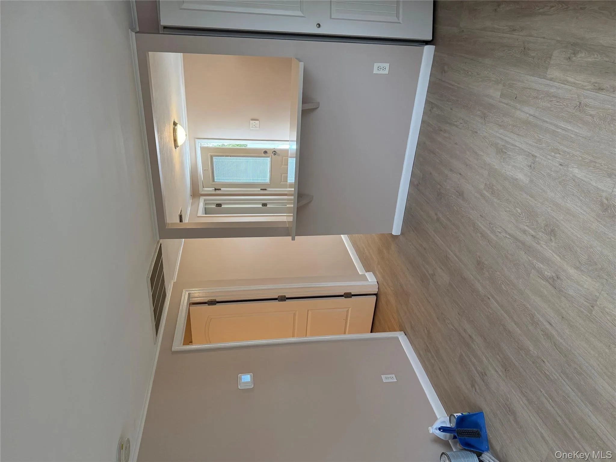 Unfurnished room with light wood-style flooring and crown molding Unfurnished room with light wood-style flooring and crown molding