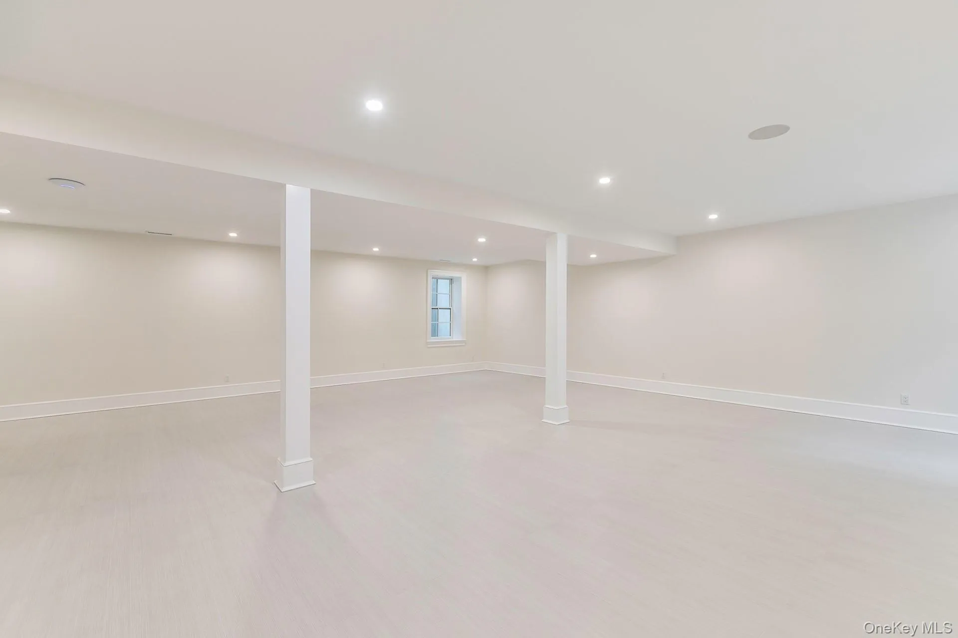 Basement with recessed lighting and baseboards Basement with recessed lighting and baseboards