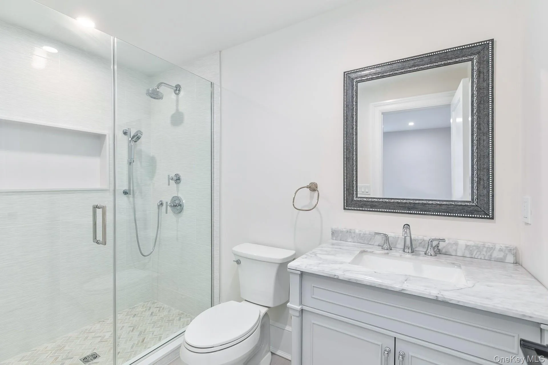 Full bathroom with vanity and a stall shower Full bathroom with vanity and a stall shower