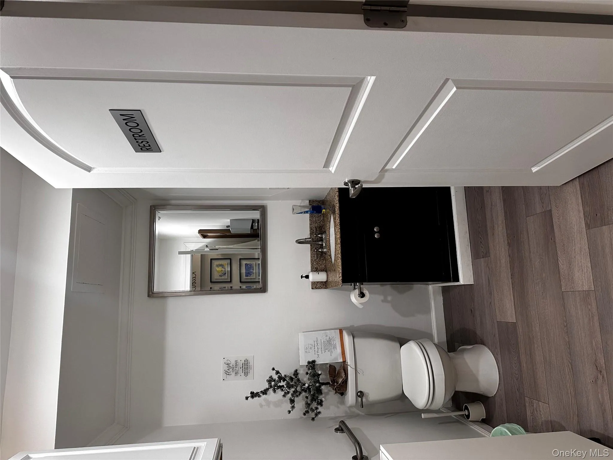 Half bath with vanity and crown molding Half bath with vanity and crown molding