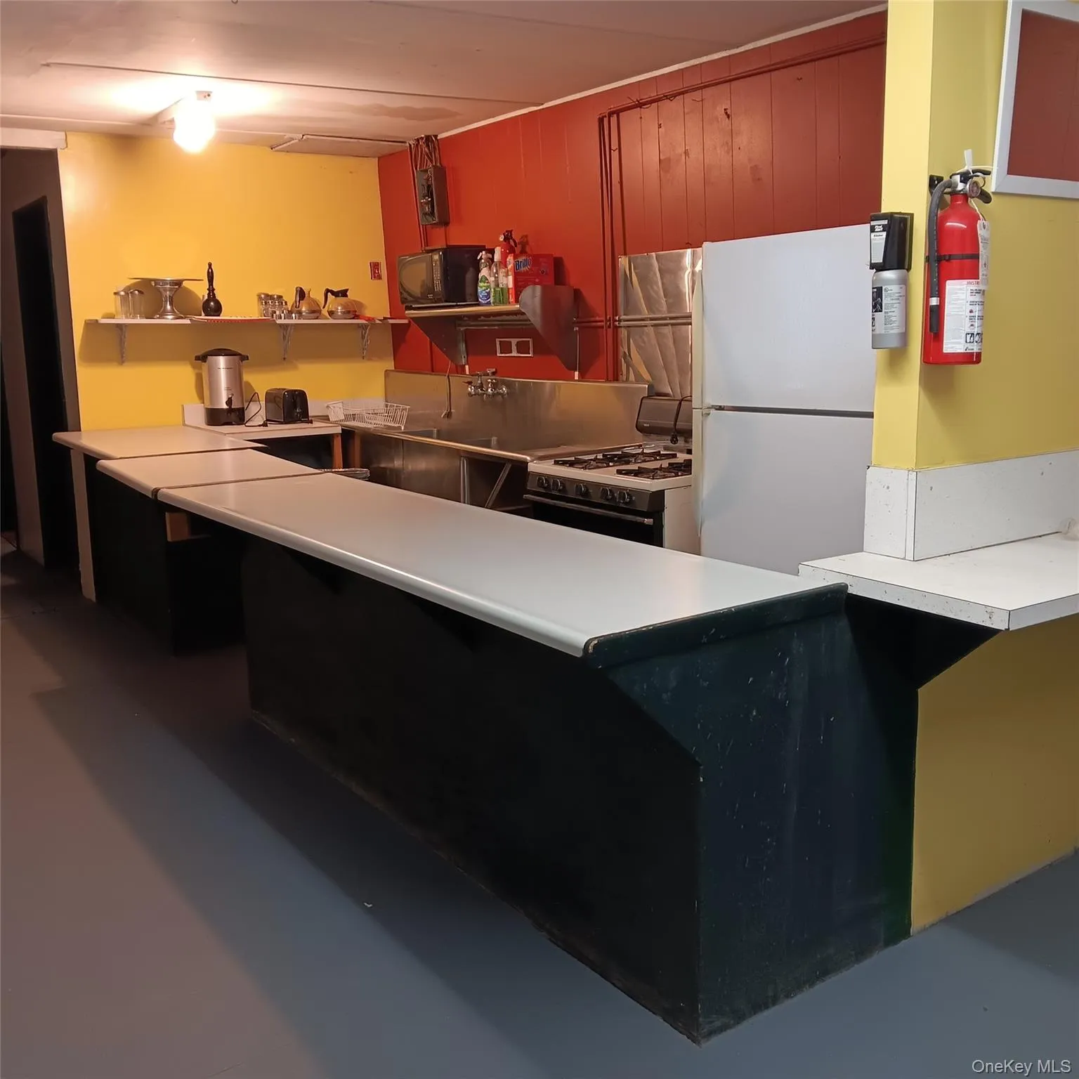 Kitchen with white appliances and light countertops Kitchen with white appliances and light countertops