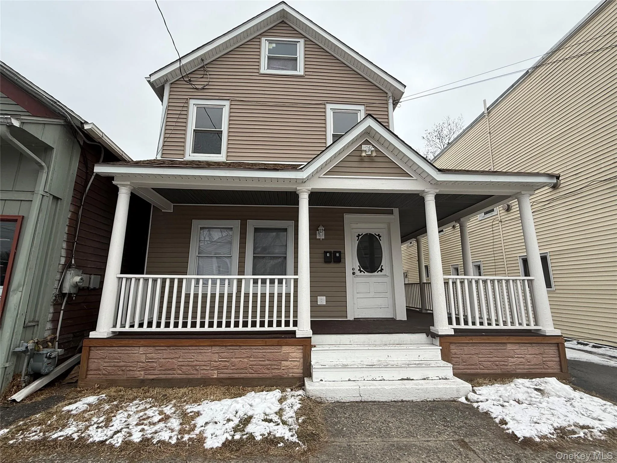 View of front facade featuring a porch View of front facade featuring a porch