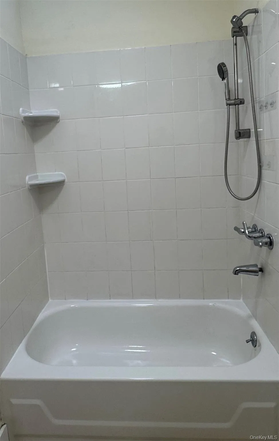 Full bathroom with shower / tub combination Full bathroom with shower / tub combination