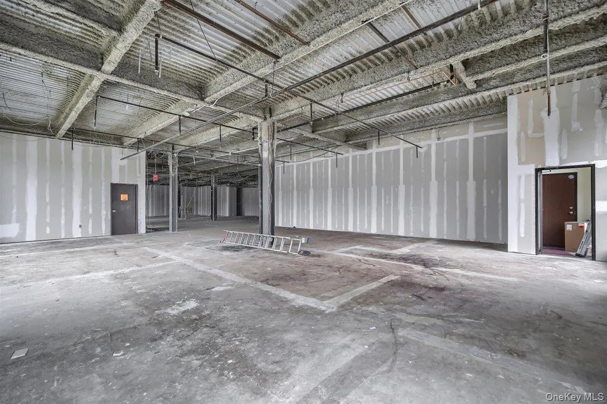 Garage featuring metal wall Garage featuring metal wall