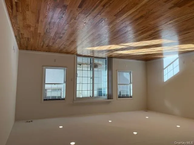Empty room featuring light wood-style floors and recessed lighting Empty room featuring light wood-style floors and recessed lighting