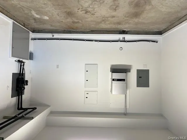 Garage featuring electric panel Garage featuring electric panel