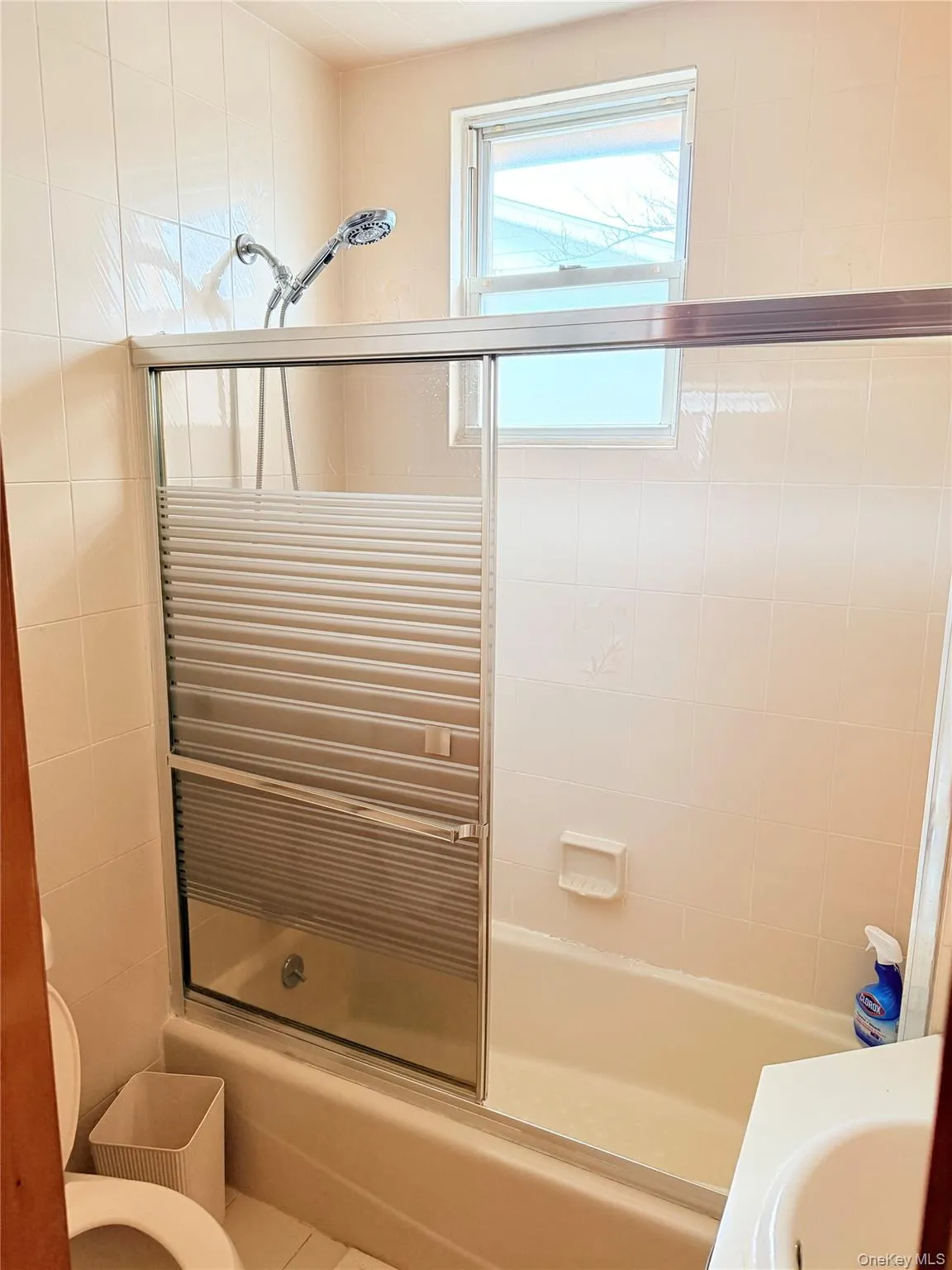 Bathroom with shower / bath combination with glass door and vanity Bathroom with shower / bath combination with glass door and vanity