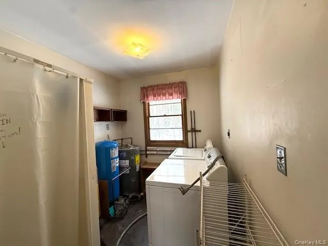 Laundry Utility room with stall shower Laundry Utility room with stall shower