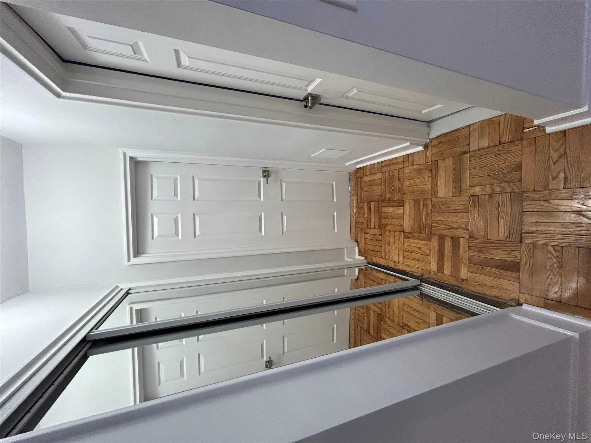 Hallway featuring baseboards Hallway featuring baseboards