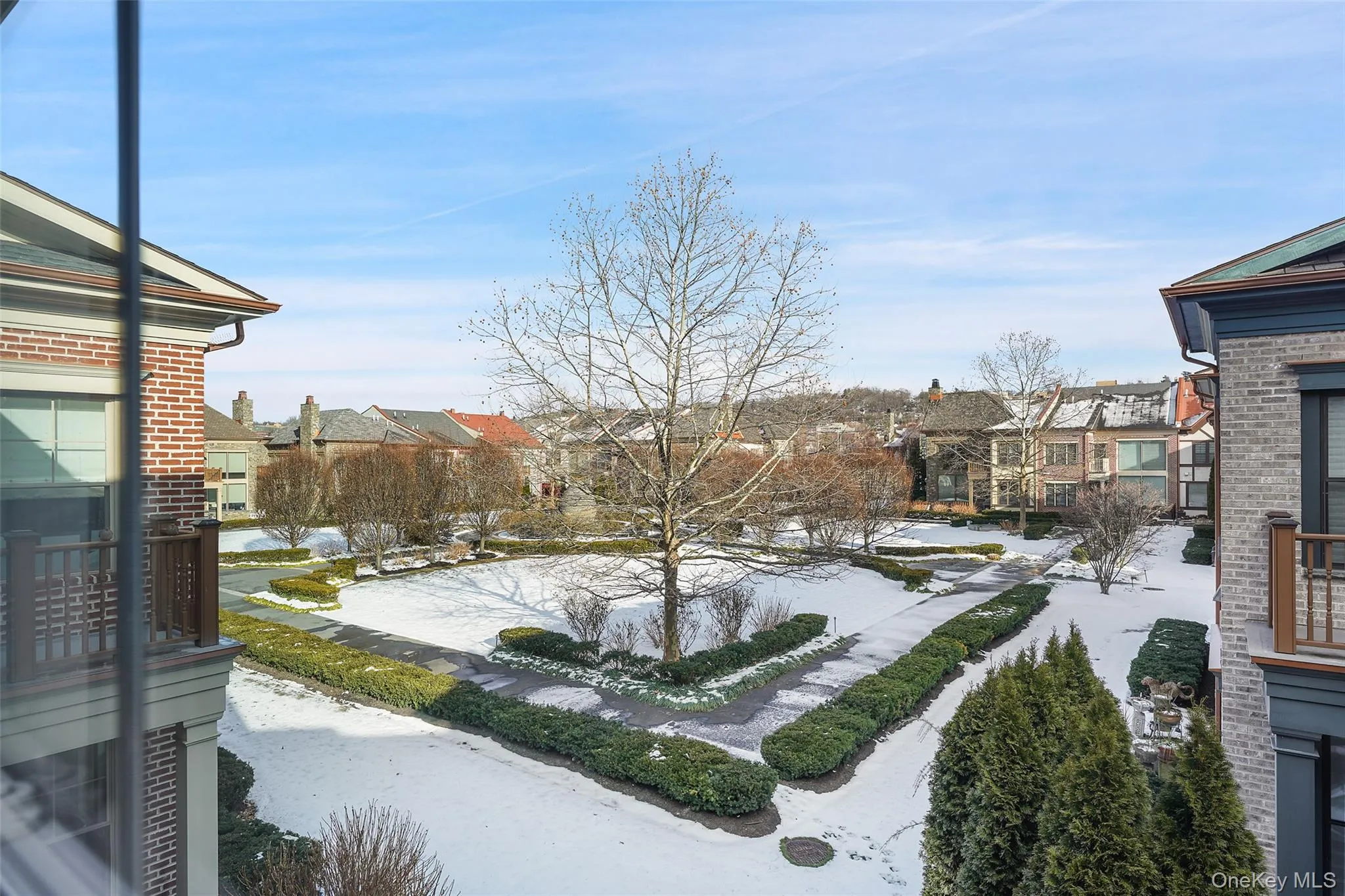 Yard layered in snow featuring a residential view Yard layered in snow featuring a residential view