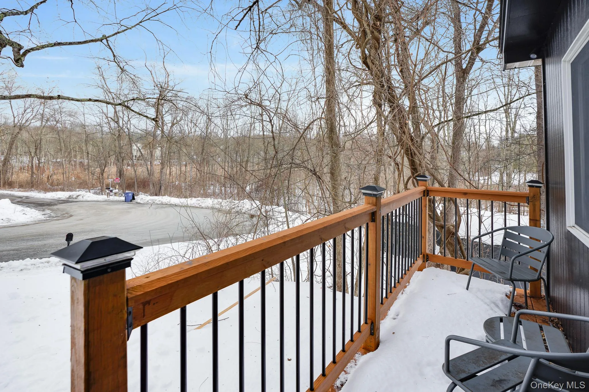View of snow covered deck View of snow covered deck