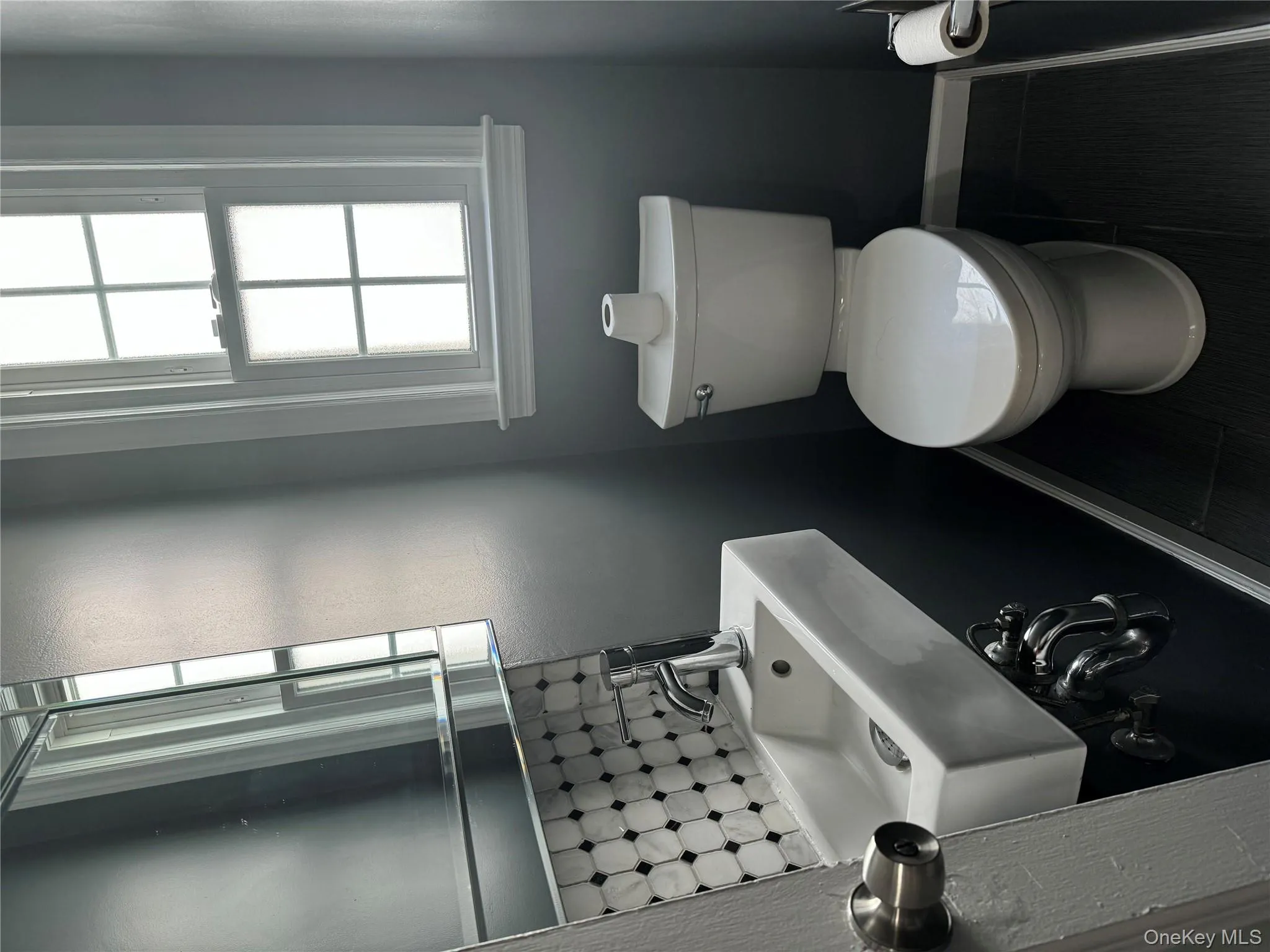 Bathroom with backsplash and toilet Bathroom with backsplash and toilet