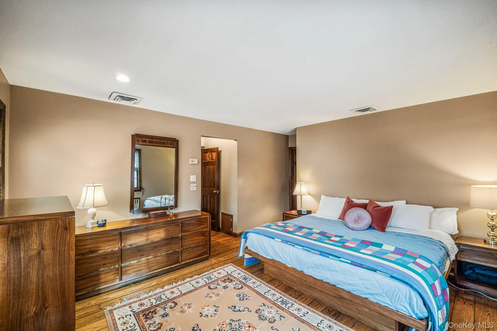 Bedroom with hardwood / wood-style flooring and recessed lighting Bedroom with hardwood / wood-style flooring and recessed lighting