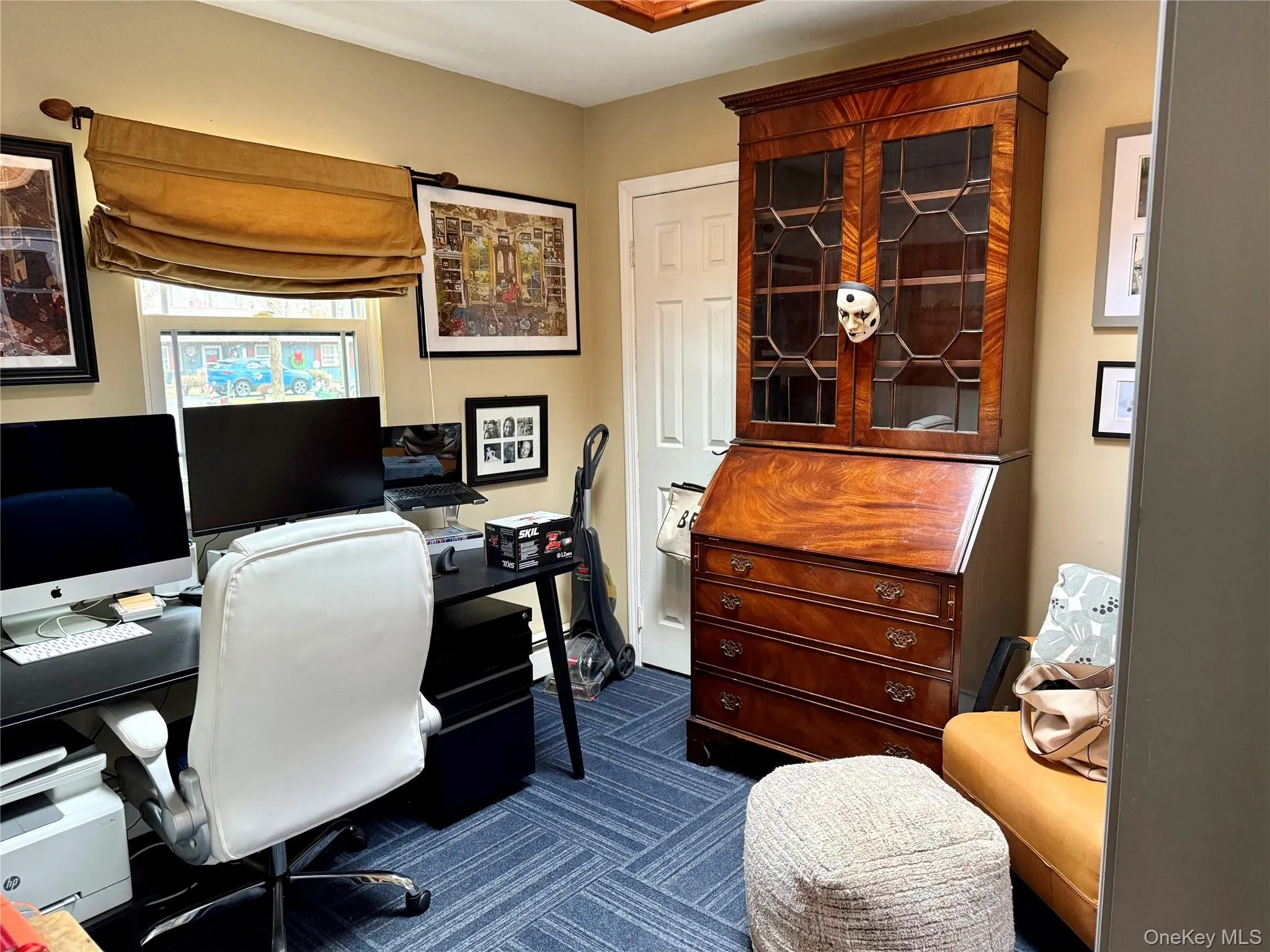 Office featuring dark colored carpet Office featuring dark colored carpet