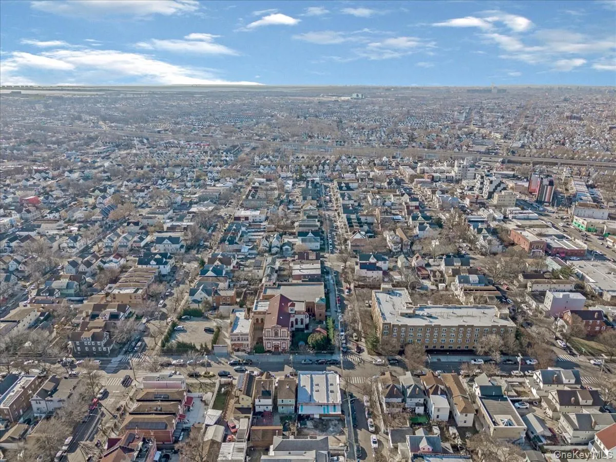 Aerial view of property's location featuring nearby urban area Aerial view of property's location featuring nearby urban area