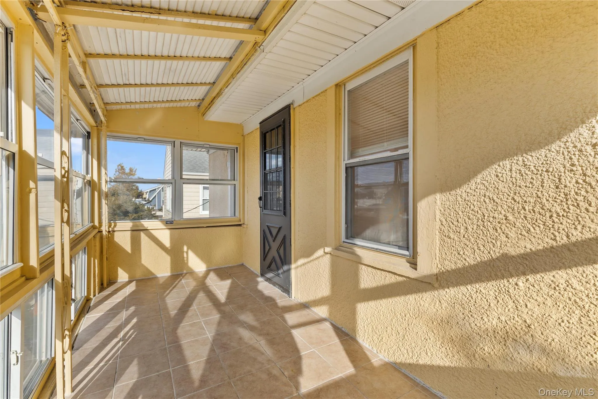 View of unfurnished sunroom View of unfurnished sunroom