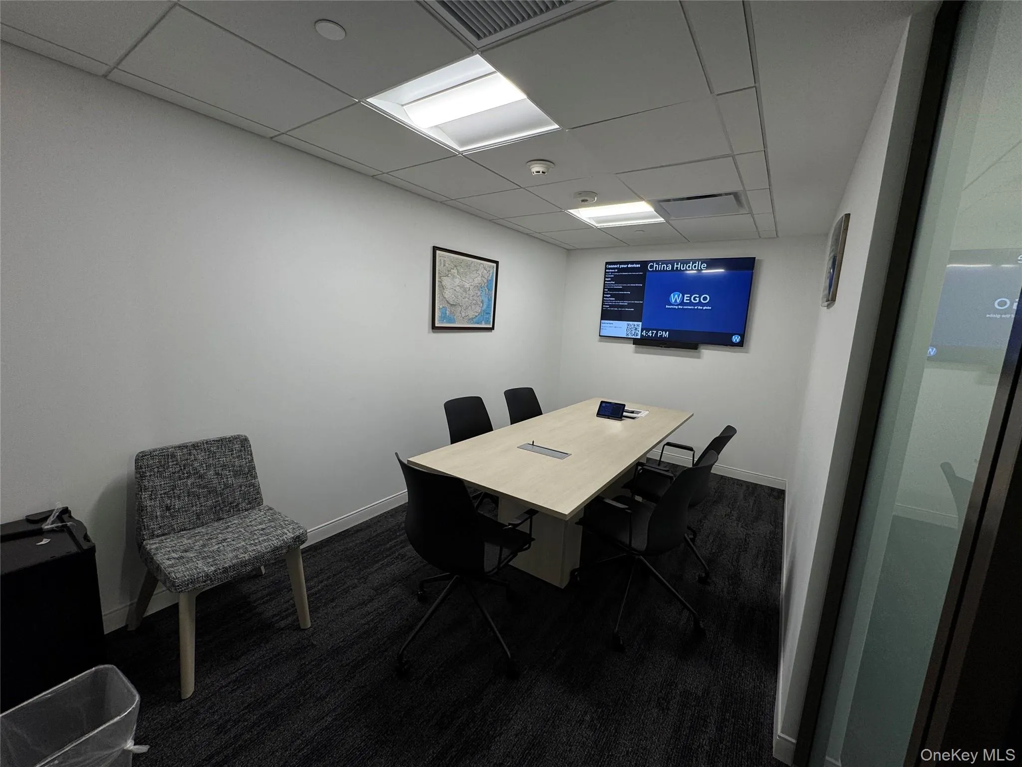 Office area featuring a paneled ceiling Office area featuring a paneled ceiling