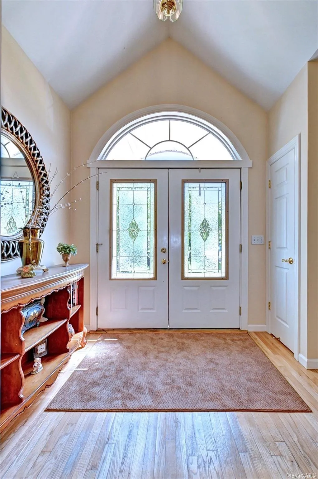 Featuring Grand Foyer with Hardwood Floors Featuring Grand Foyer with Hardwood Floors