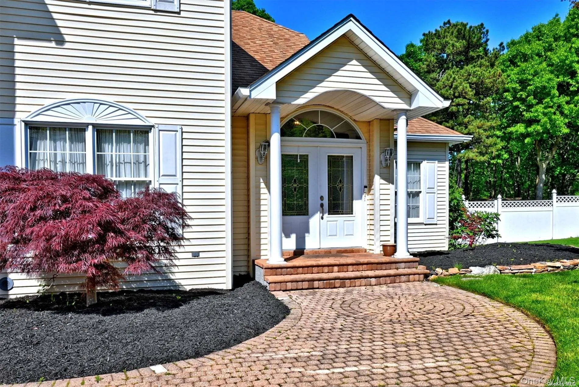 Welcoming Entryway with Stone Porch and Gorgeous Portico. Welcoming Entryway with Stone Porch and Gorgeous Portico.