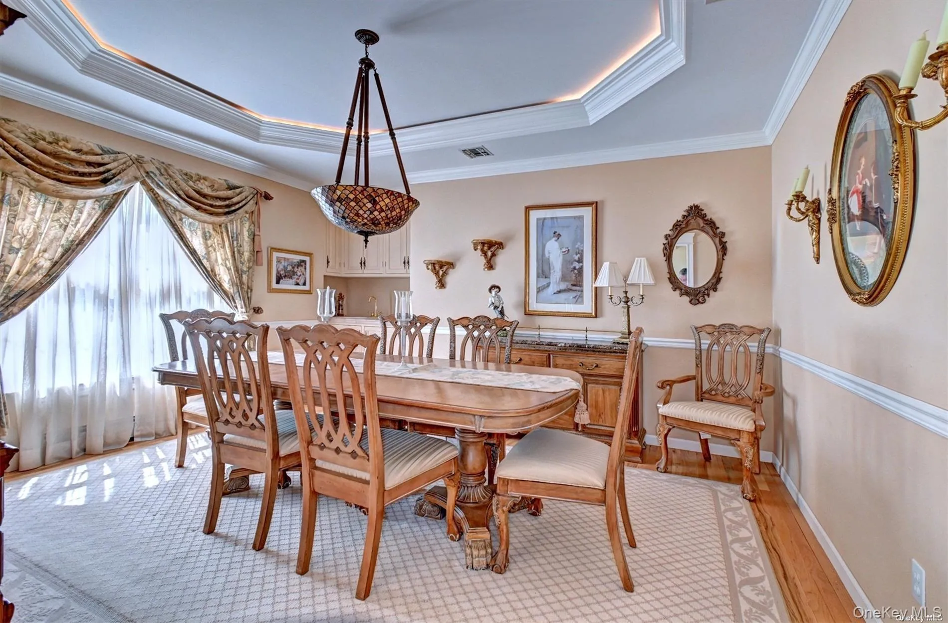 Large Dining Room with Hardwood Floors & Tray Ceiling. Large Dining Room with Hardwood Floors & Tray Ceiling.