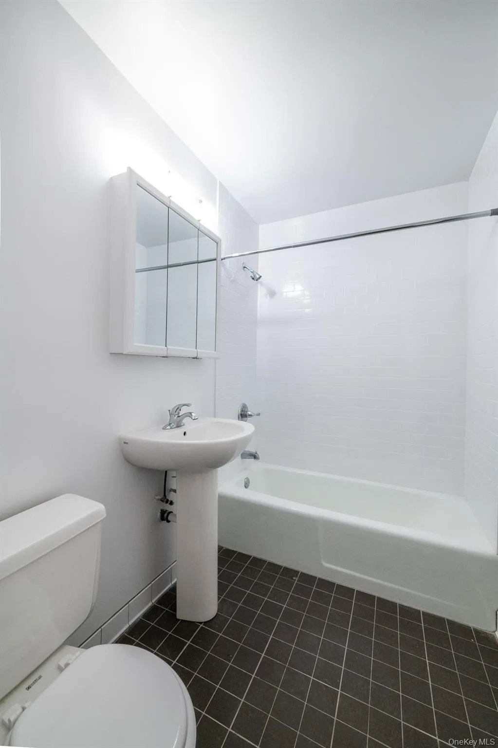 Bathroom with shower tub combination, pedestal sink, medicine cabinet, toilet - finishes may vary Bathroom with shower tub combination, pedestal sink, medicine cabinet, toilet - finishes may vary