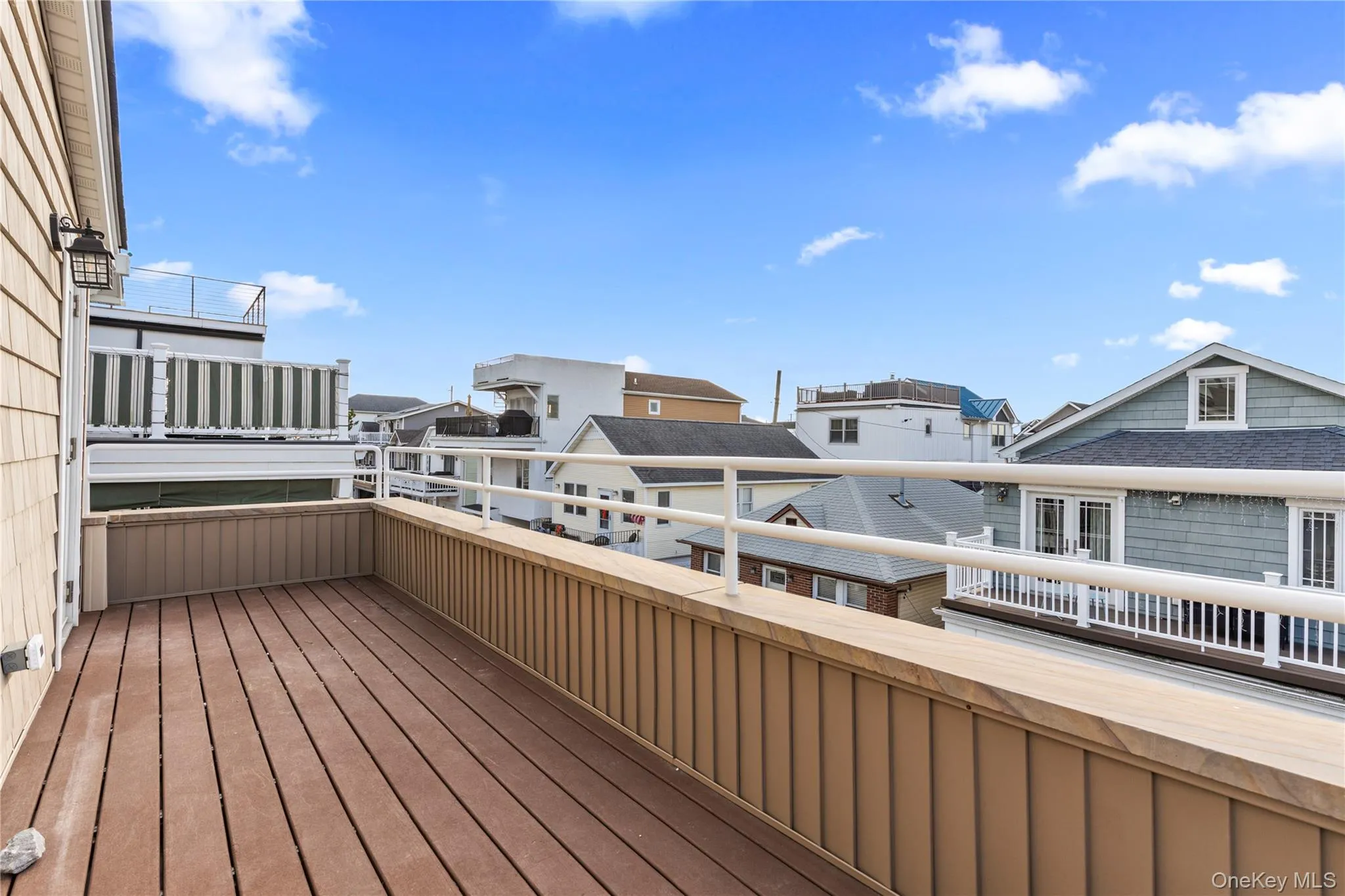 Deck with a residential view Deck with a residential view