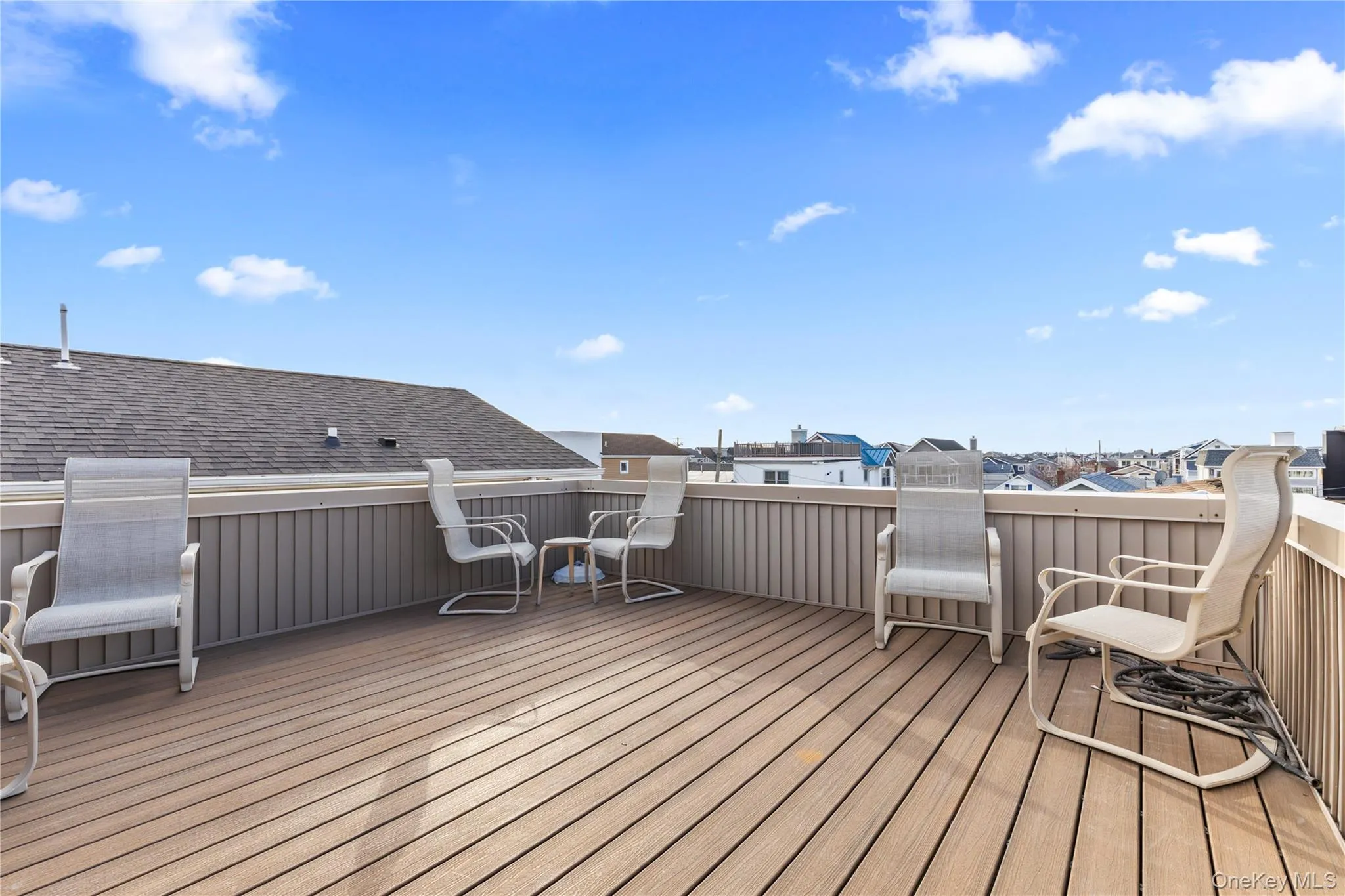 Wooden terrace with a residential view Wooden terrace with a residential view