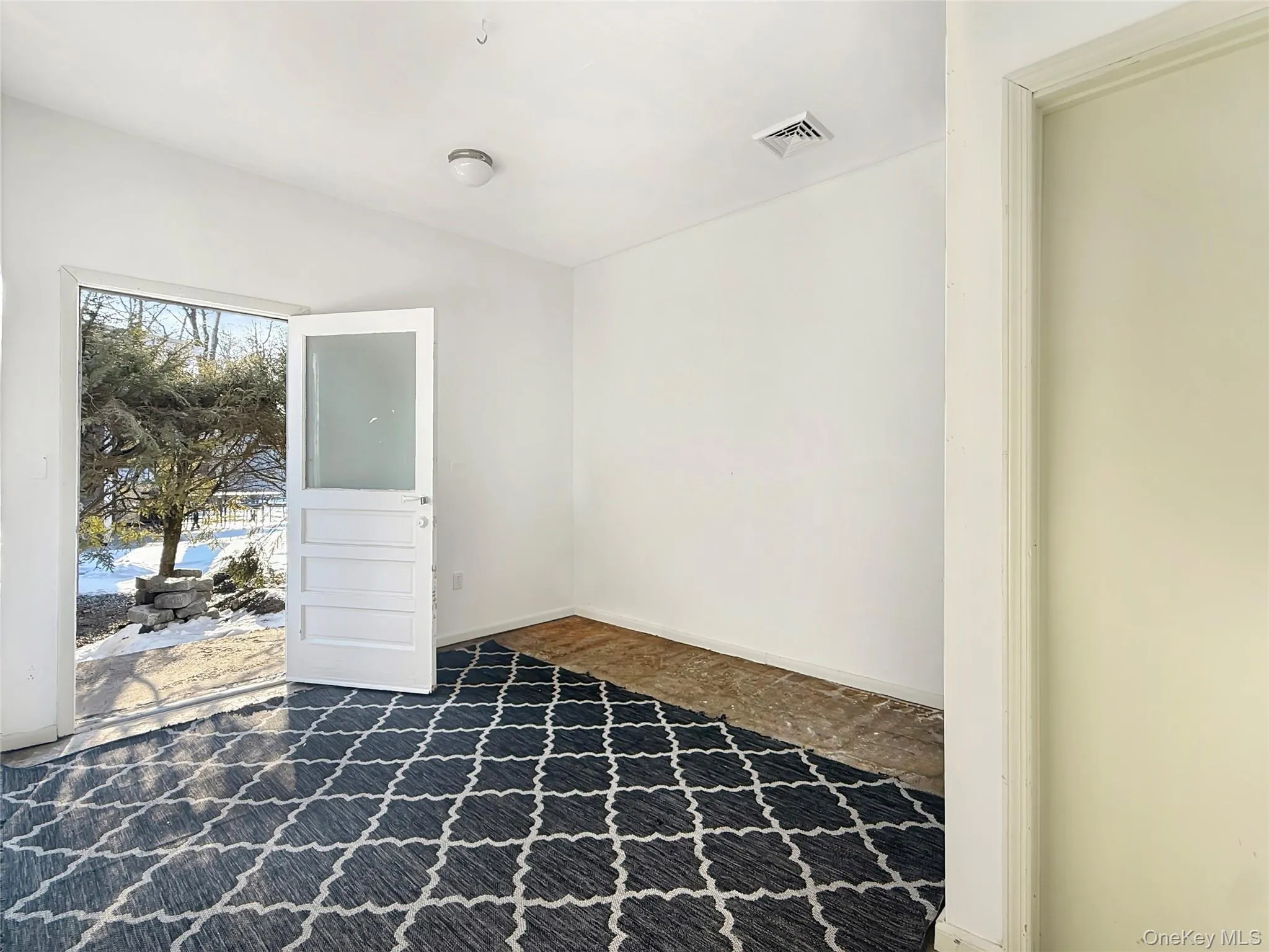 Entry foyer/lobby with access to bathroom Entry foyer/lobby with access to bathroom