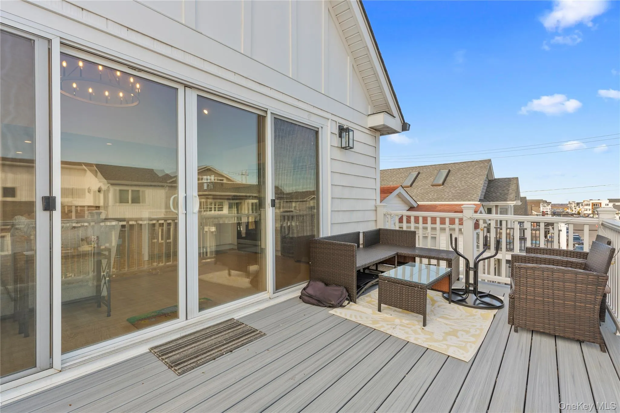 Wooden deck featuring an outdoor hangout area Wooden deck featuring an outdoor hangout area