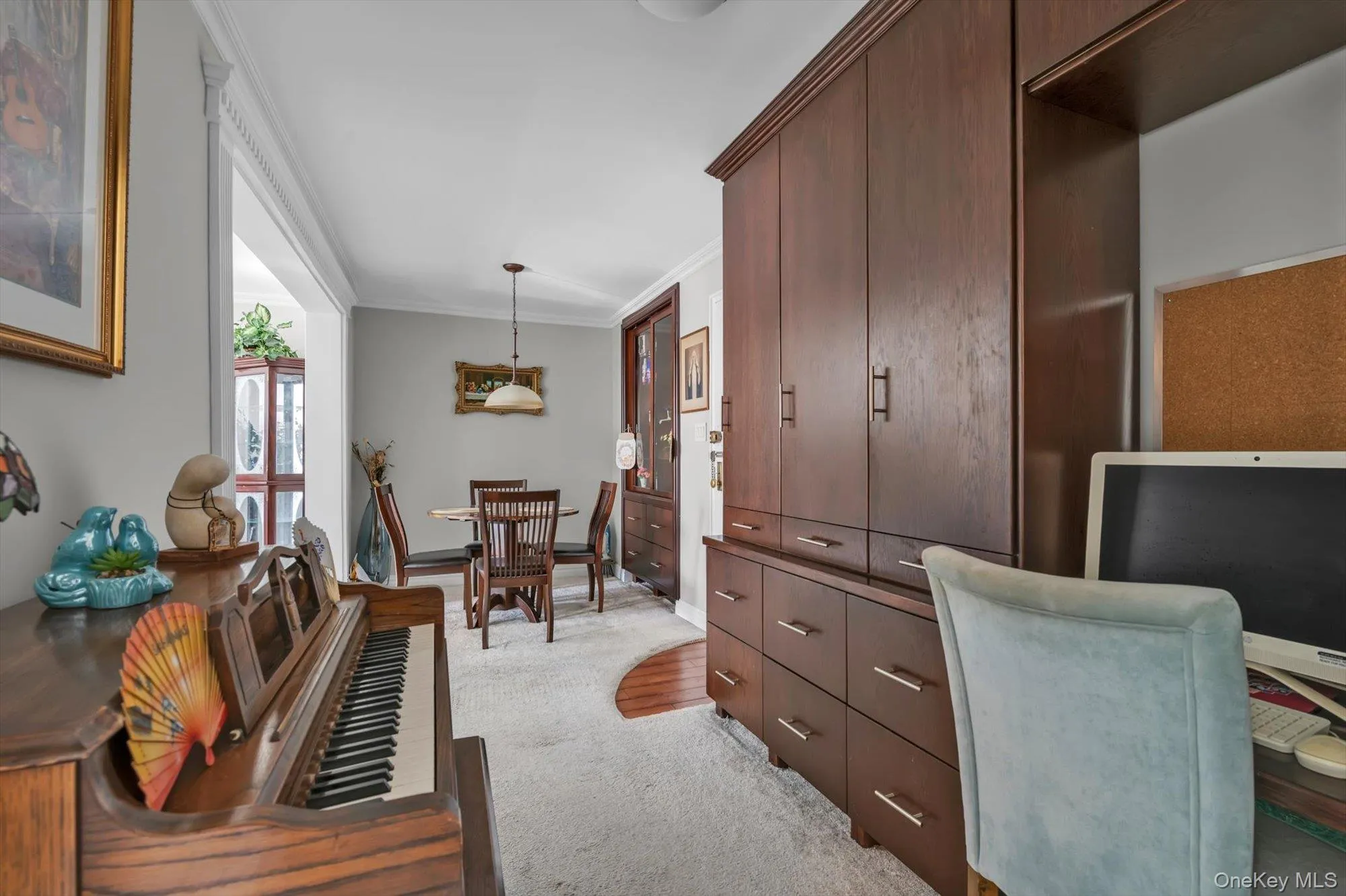 Office with crown molding and light carpet Office with crown molding and light carpet