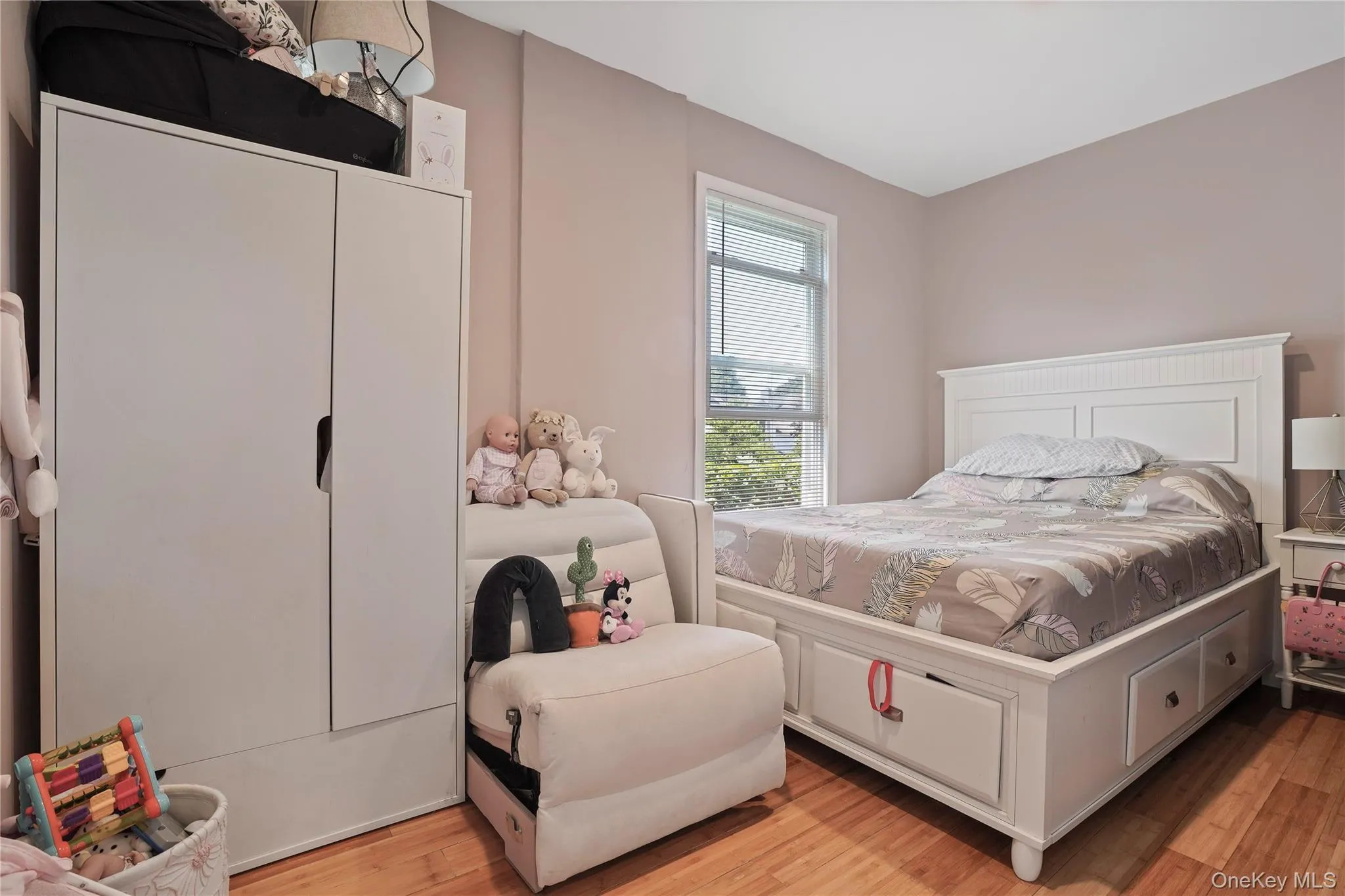 Bedroom with light wood-style floors Bedroom with light wood-style floors