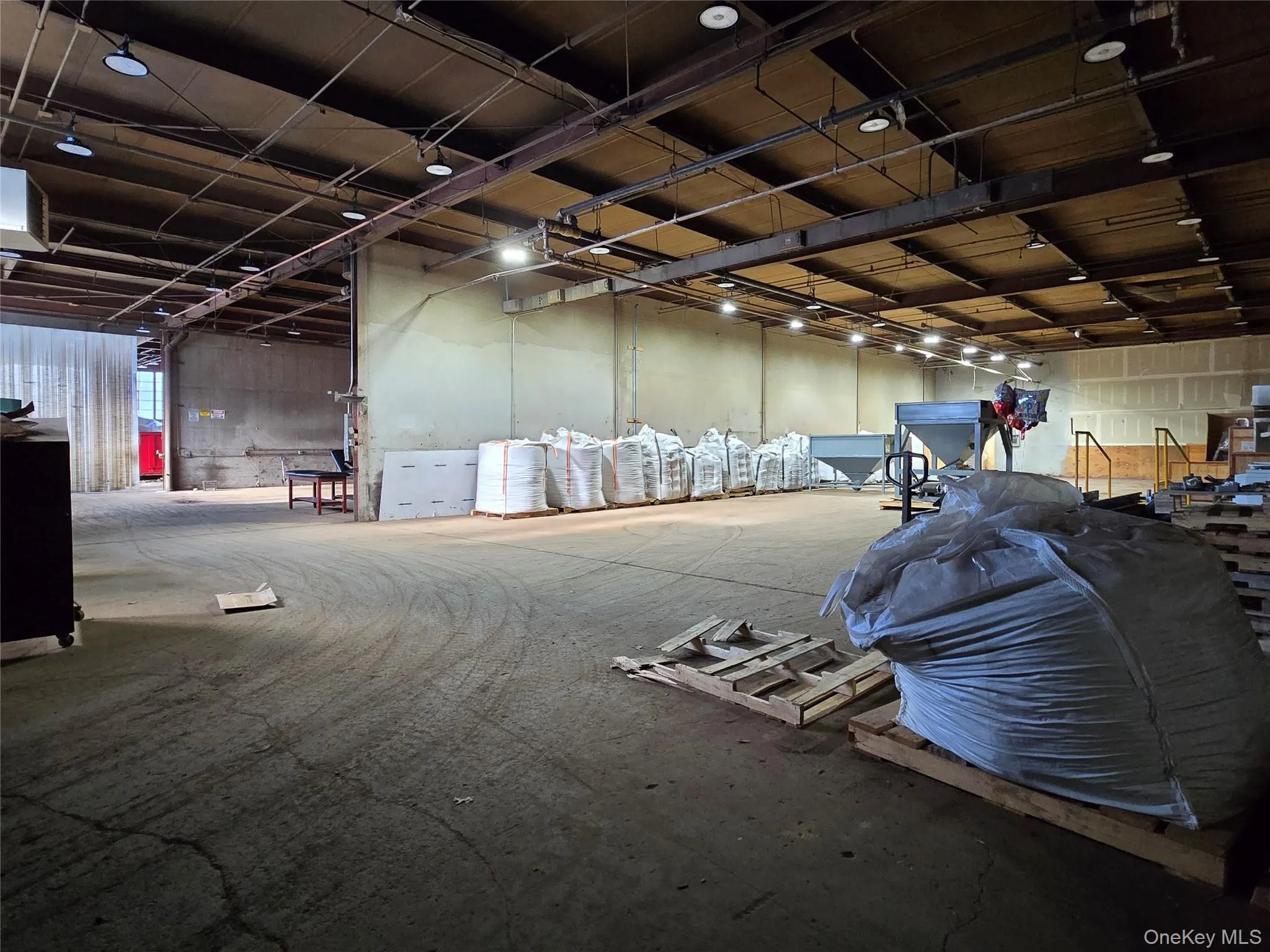 Miscellaneous room featuring a garage Miscellaneous room featuring a garage