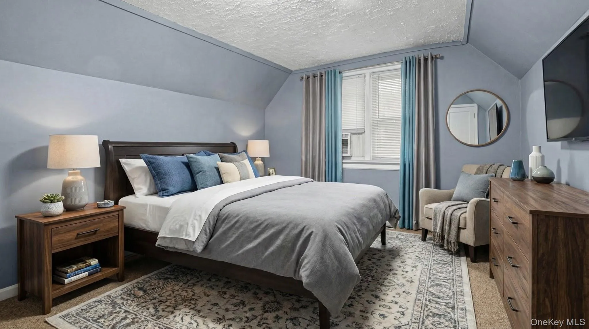 Bedroom with a textured ceiling, vaulted ceiling, and light carpet Bedroom with a textured ceiling, vaulted ceiling, and light carpet
