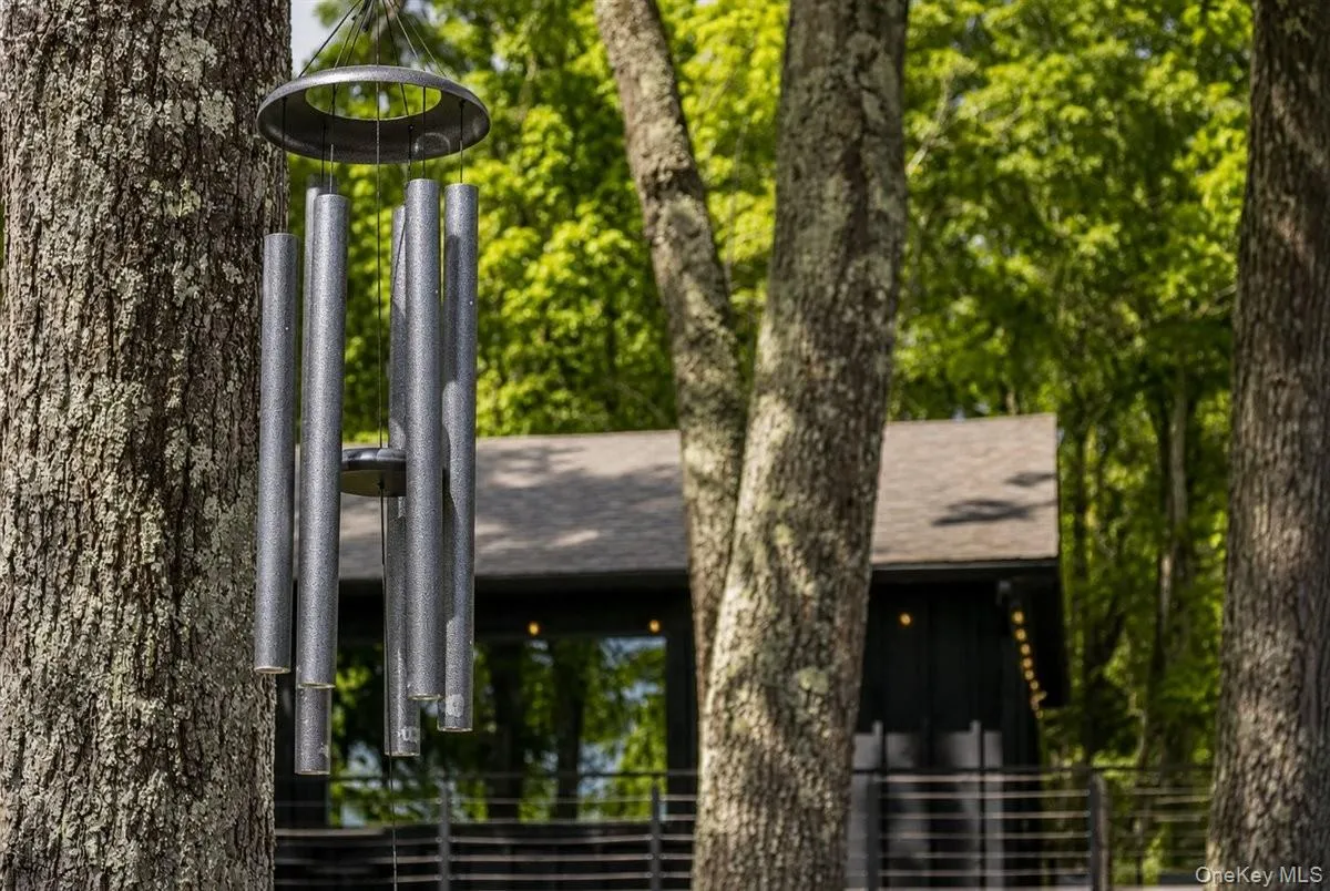 Wind Chimes w/ Guest House in the Background Wind Chimes w/ Guest House in the Background