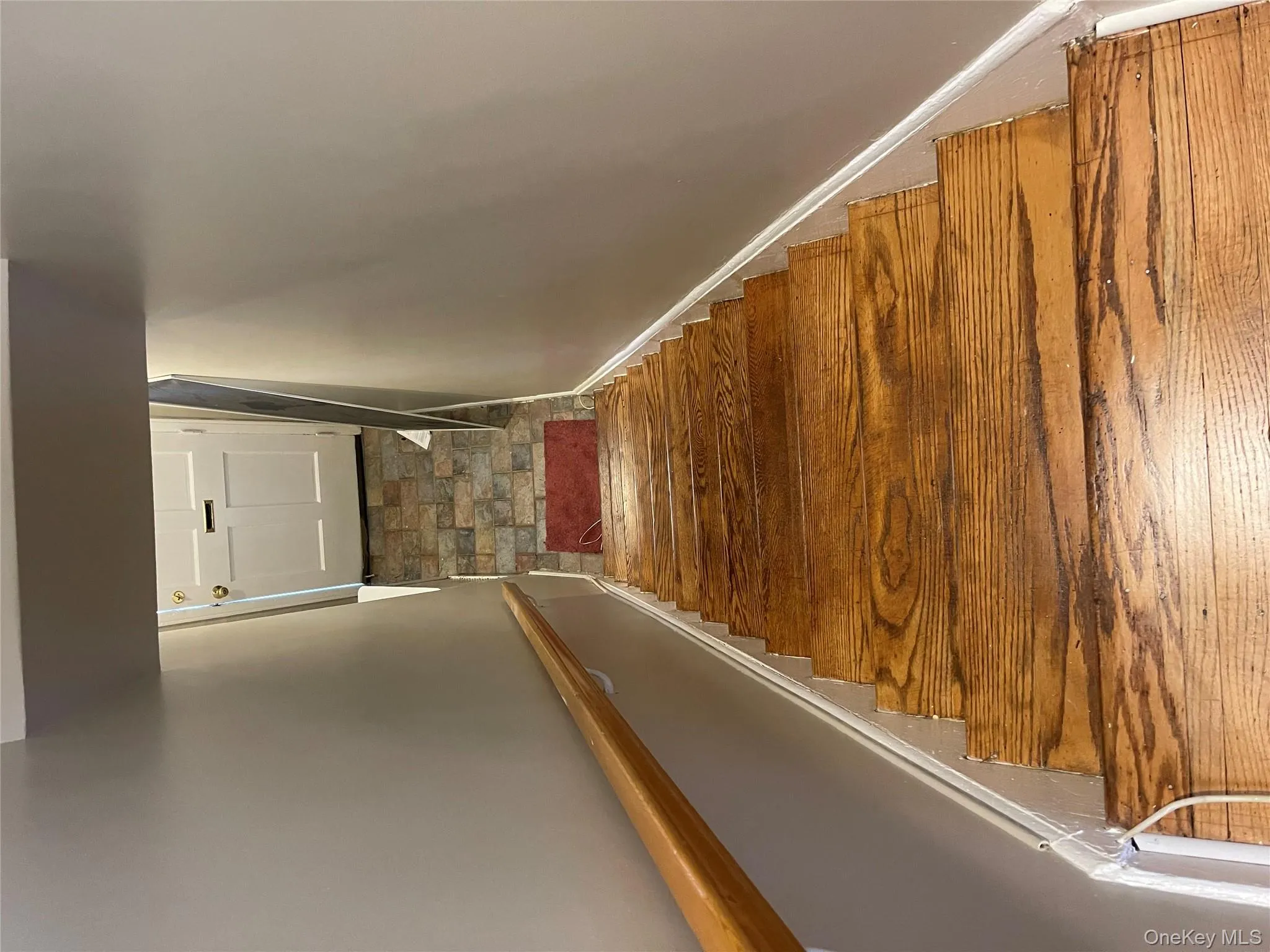 Stairs featuring baseboards Stairs featuring baseboards