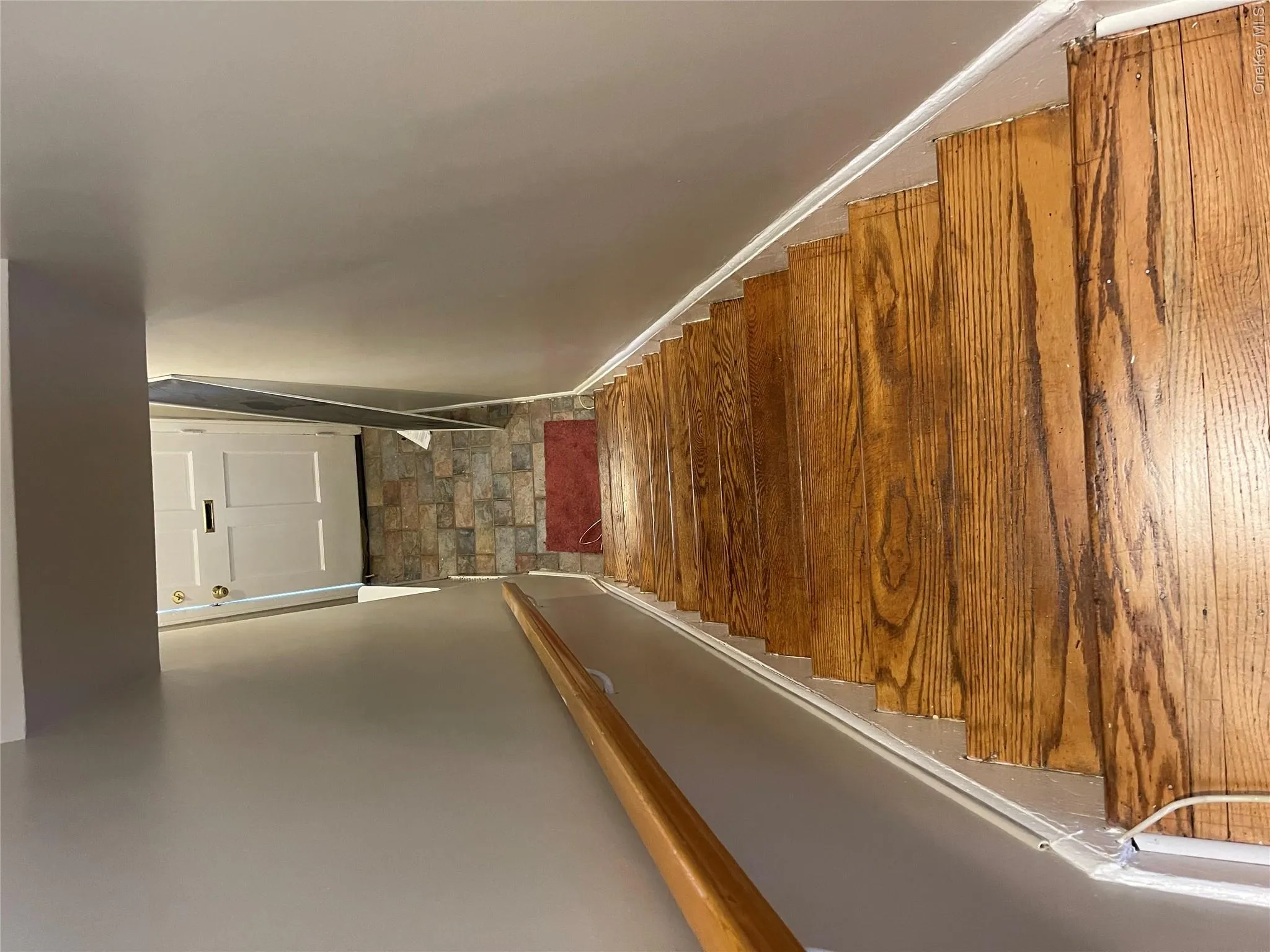 Stairs featuring baseboards Stairs featuring baseboards
